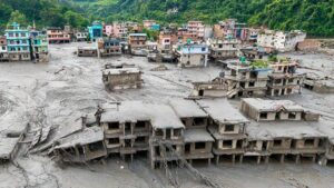 Buildings damaged and covered in mud following severe flooding in Nepal